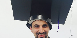 Mohamed Sbeiti with his doctor hat