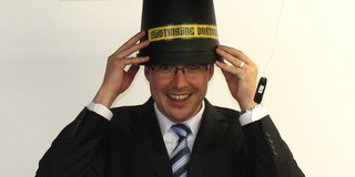 Christoph Ide with his doctor hat
